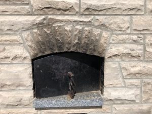 clean soot from stone